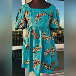 Queen of Sparkles Leaping Leopards Babydoll Dress. Size XS